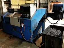 Mazak #QT-15, CNC lathe, 15" swing, 8" chuck, 12 station turret, tailstock, chip conveyor, S/N 76742