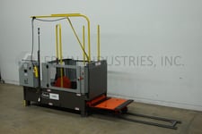 4000 lb. Columbia #LTS-C, pallet transfer machine, designed to transfer product from one pallet to another