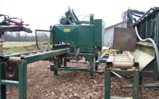 Pendu 4 Head drill station, 20' with powered roll case, Hydraulic set stops