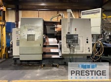 Okuma #Impact-LU45, 4-Axis, OSP-200L, upper/lower turret, 3-Jaw 24" chuck, hydraulic tailstock, chip
