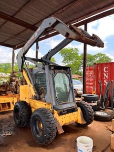 New Holland #LS-190, Skid Steer Loader, enclosed cab, with matching parts machine, 2002