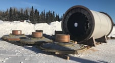 10.5' x 18.5' Outotec Ball mill with 1000 HP, cast mill heads, unused surplus (2 available)