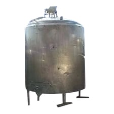 1000 gallon Waukesha Cherry-Burrell FPDA, Vertical Mix Tank, 77" dia. x 7' H tank, 2-1/2" manway cover, 3"