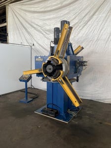 8000 lb. Arku #AH3000/2/350/FU-4Q, double end power coil reel/uncoiler, 12" width, 60" outside dimensions