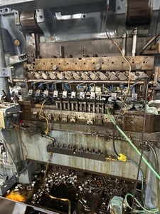 45 Ton, U.S. Baird #MTP4L-37, transfer press w/12 Op die set, 5" stroke, 1980