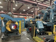 18.5" United, 4-Hi one way cold rolling mill, 10 work rolls, 6 back up rolls, L to R