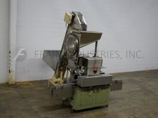 Resina #U40-806, automatic, 4 station 8 spindle, capper rated from 20-300 containers per minute, control