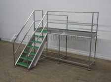 Material Handling, Stainless Steel mezzanine equipped with a 120" x 30" standing platform set 57" off the