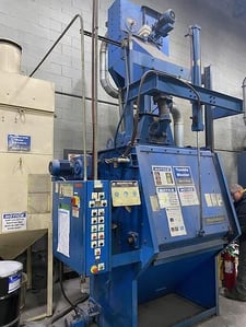 6 cu.ft. Wheelabrator #TBS-6, steel belt tumblast, 15 HP direct drive wheel,pneumatic door, 1996