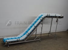 22" wide x 21.2' long, Tri-Mach, Stainless Steel inclined cleated conveyor, 96" discharge height