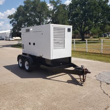 62 KW Multiquip #DCA85USJ, diesel, Ultra silent on trailer, 240/480 Volts, 5911 hours, 2005