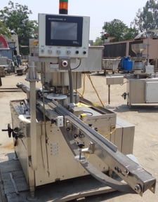 Genesis #RW-250SS, Rotary Vial Capper, (6) Pockets, 2-1/2" width x 10' L belt conveyor, 120 V, 1997
