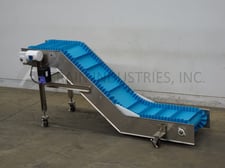 BMI / Benda Mfg, Stainless Steel feeder, inclined cleated conveyor, mounted on Stainless Steel multi-leg