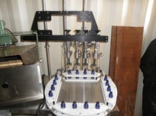 E-Pak, Bottle Filler, 4-Head, (4) 3/8" diameter Nozzles, rotary turntable w/(4) slots, 1/4" diameter Fill