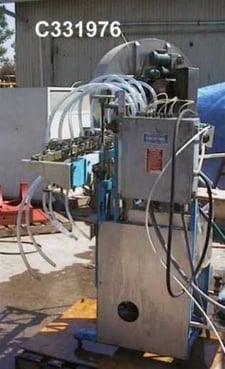 Simplex #480A, Bottle Filler, 8 Valve inline, 9/16" diameter Valve, 150 psi, 230/460 V, pneumatically actuated
