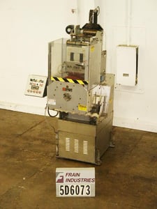 Universal Labeling Systems Labeling Systems #6000, automatic stainless steel neckbander capable of sp