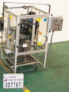 PDC Intl. Corp. #65-ER, 8 station rotary tamper evident neck bander / sleever labeler rated from 50-200 neck