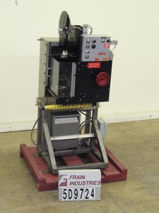 PDC Intl. Corp. #75M, automatic, tamper evident, neck bander / sleever rated from 50-300 containers per minute