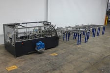 Climax #C3, automatic, intermittent motion, 6 lane, side load, hot melt glue cartoner, up to 15 cartons per