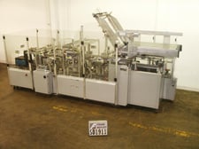 Kodiak #710RSC, automatic, case erector, packer, hot melt glue sealer rated from 3-20 cases per minute