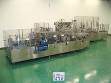 Douglas Machine Inc #6CTF21, fully automatic case erector / packer / glue sealer capable of 5-25 cases per