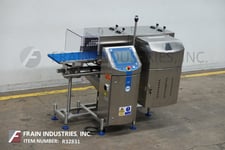 Loma #CW3-1500, inline, checkweigher rated up to 140 feet per minute, mounted on height adjustable 4-leg base