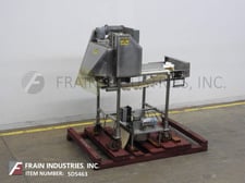 Multi-slicer with (3) 12" blades slicing product in segments