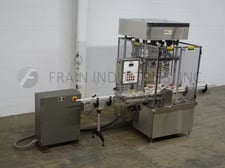 MRM Elgin #RFL, automatic, 12 head, Stainless Steel rotary, fill to level pressure gravity filler rated from