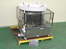 Biner Ellison #40, 40 valve, rotary, pressure gravity filler rated up to 500 containers per minute