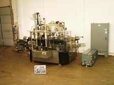 Krones #Starmatic, fully automatic 16 station spot front cold glue labeler with a Garantomtic neck band