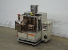 Norden #NM400HA, automatic, hot air, plastic or laminate tube filler and sealer rated from 10-40 tubes per