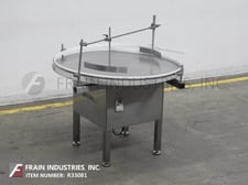 Accutek #48U, 48" OD, Stainless Steel, rotary disc unscrambler, mounted on 4 leg Stainless Steel base