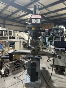Clausing Kondia #FV-1, Knee Mill, 9" x48" table, 3 HP, ProtoTrak M2 CNC Control, Kurt vise, S/N Z-656
