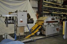 6600 lb. Aida #LFG-600R(1), space saver coil feed line, 55" OD, 16"-20" ID, 18.11" x .125" straightener