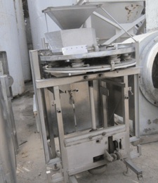 Rotary Table Volumetric Filler, 7-Head, Stainless Steel, 1-7/8" diameter x 3" deep Cup, 36" diameter Rotary