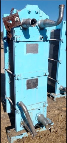 390 sq.ft., APV, R-56-M, plate type heat exchanger, (59) 60" L x 16.5" W Stainless Steel plates, (1) 3" top