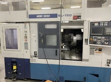 Mori Seiki #SL-150, CNC lathe, 24.4" swing, 1.3" bar, 24.8" machining length, 16.92" turning diameter, 1997