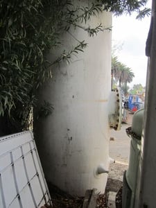 1200 gallon Fiberglass Tank, 56" diameter x 8' 6" straight side, 24" diameter Bottom side manway, 18" top