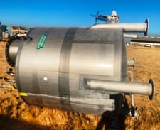 1250 gallon Stainless Steel Tank, 6' diameter x 6' straight side, 1.5" diameter Center bottom discharge, 46"