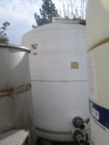3100 gallon Xerxes Corporation, Fiberglass Tank, 8' diameter x 8' 5" straight side, 24" diameter Top manway