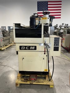 DCM #PDG-5-3 PLC, automatic punch & die rotary surface grinder, 6" chuck, 3-jaw, 5" x7" magnetic chuck, 18"