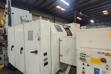 Gleason #CG300, CNC cutter sharpener for both style blades, 5-Axis, robotic loading, 2005