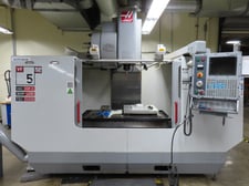 Haas #VF-5, 50" x26" travels, 24 automatic tool changer, Cat 40,7500 RPM, gear box, 4th & 5th drives, coolant