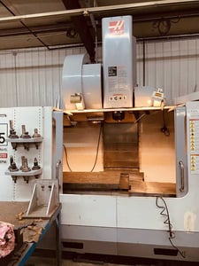 Haas #VF-5/50XT, 30 automatic tool changer, 60" X, 26" Y, 7500 RPM, #50, 30 HP, Renishaw OMP 40-2 probe, chip