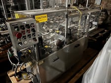 MGS #RPP-221, Rotary Outserter, 2.73" - 1.5" loader, 4' infeed conveyor, Hot melt