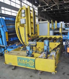 2200 lb. AIM traveling upender, 6" dia. x 44" face rolls, 3 HP motor, 66" long support arms, 2001,S45189