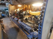 Weinig #Unimat-23-EL, feed through moulder, 9-head, 11-13/16" x 4-3/4" capacity, 2" spindle diameter, 2006
