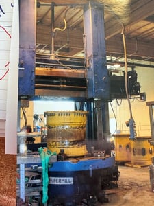 78" Rafamet #KCF-200, vertical boring mill, 96" swing, 2 swiveling ram heads, 4-jaw table