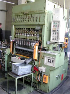 30 Ton, Aida Engineering #FT-C2-30, 11 station, 6 ton/punch transfer press, zig zag