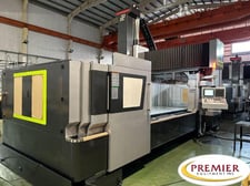 Starvision #DX-3220, CNC bridge mill,Fanuc 0iMF, 32 automatic tool changer, 6000 RPM, 50/40 HP,thru spindle
